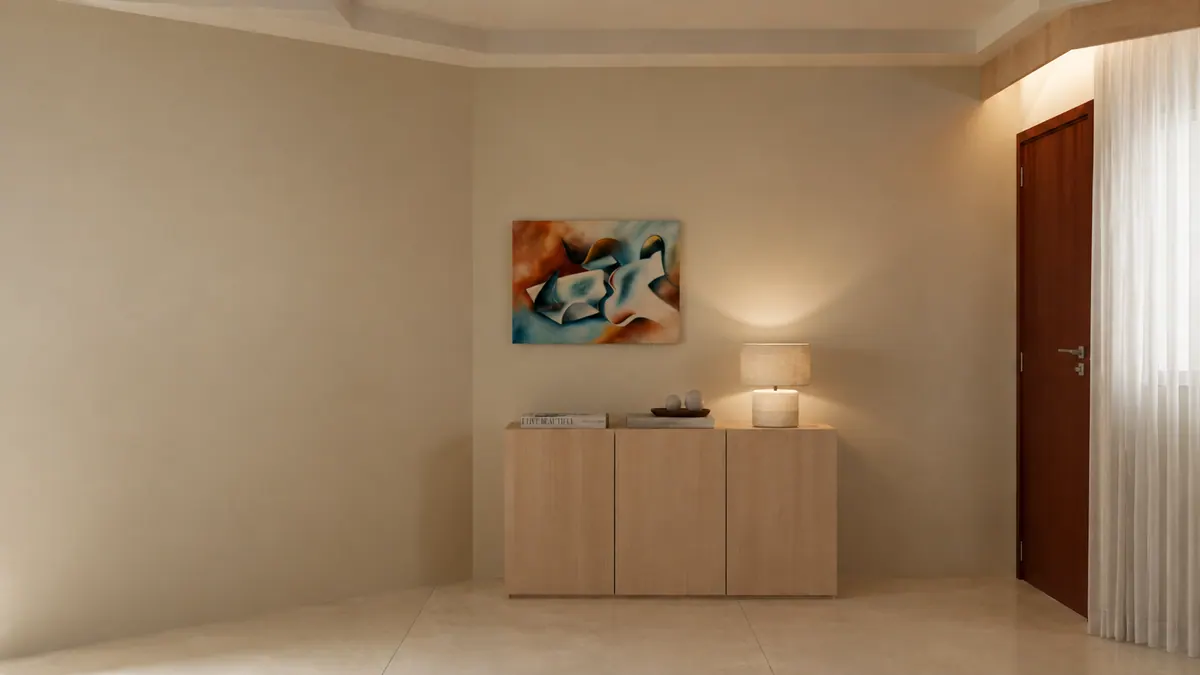 Canto do hall com aparador de madeira, abajur e quadro abstrato ao lado da porta